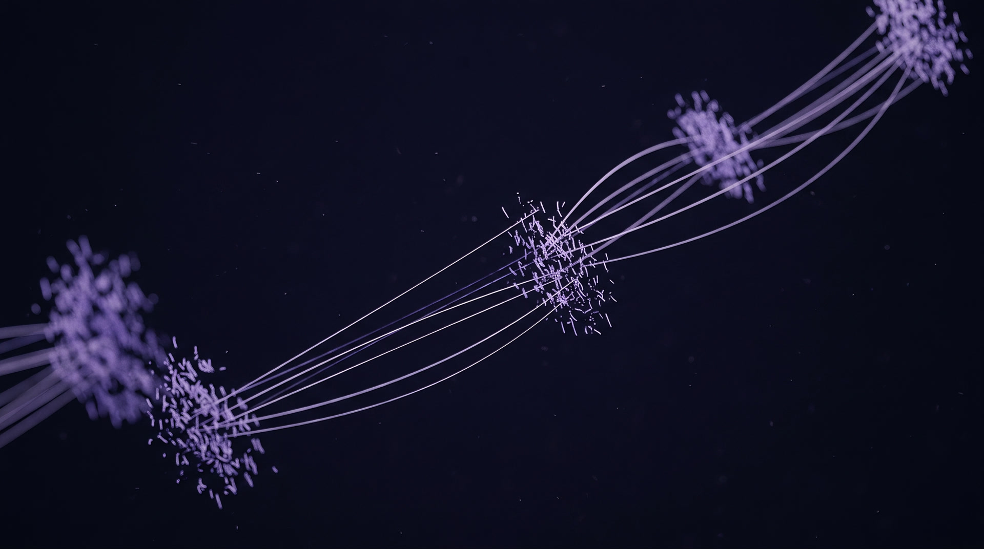 Separate clusters joined by fine threads of light